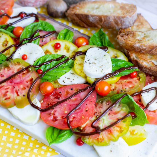 Black Garlic Drizzled Caprese Salad - Recipe photo by GradFood