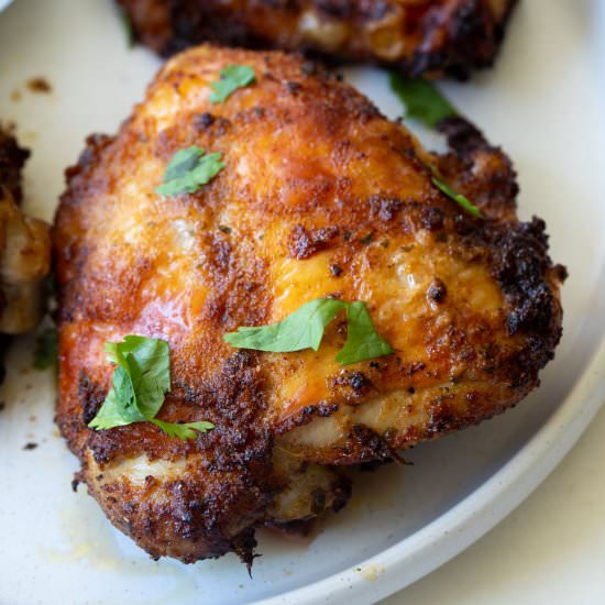Air Fryer Bone-In Chicken Thighs - Recipe photo by Kelli @ Hungry Hobby