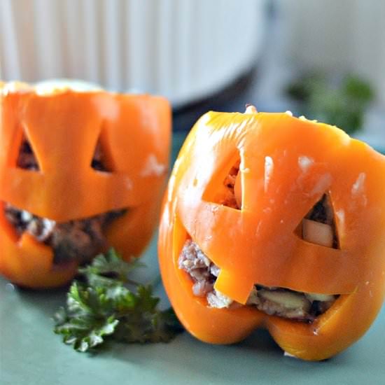 Jack O Lantern Stuffed Peppers - Recipe photo by We Want To Eat