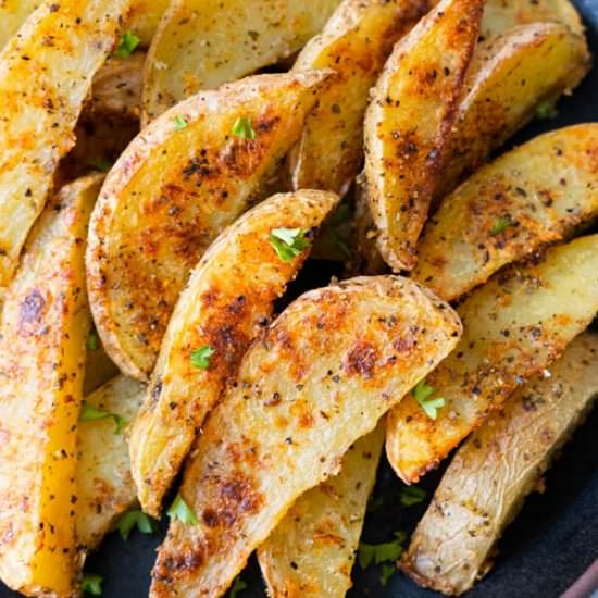 Garlic Parmesan Potato Wedges - Recipe photo by rasamalaysia
