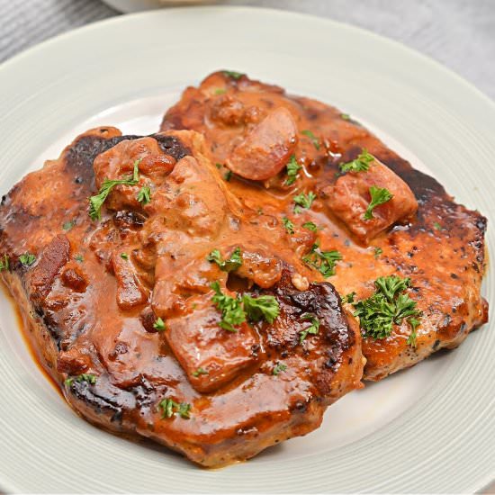 KETO TOMATO CREAM SAUCE PORK CHOPS - Recipe photo by Stylish Cravings