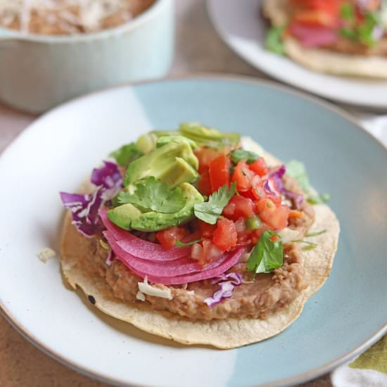 Refried bean tostada - Recipe photo by cadryskitchen