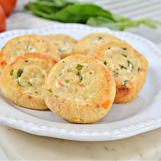 TOMATO BASIL CREAM CHEESE PINWHEELS - Recipe photo by Stylish Cravings