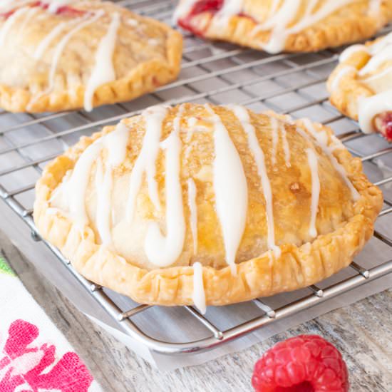 Glazed Raspberry Hand Pies - Recipe photo by For the Love of Cooking