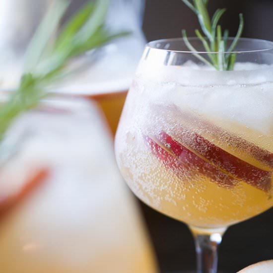 Sparkling Pear + Kumquat Sangria - Recipe photo by sipandsanity