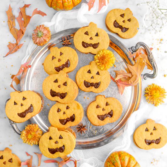 Jack O'Lantern Sandwich Cookies - Recipe photo by bakerstable