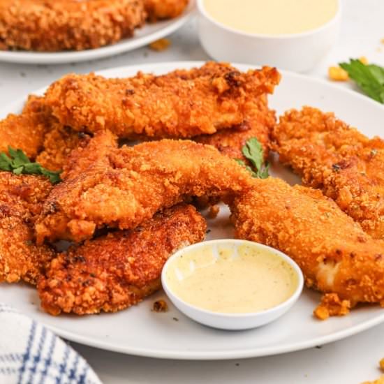 Cap’n Crunch Chicken Fingers - Recipe photo by noshingwiththenolands