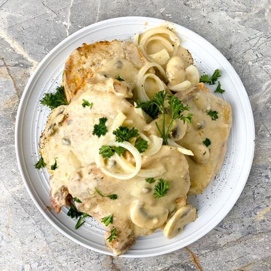 Crock Pot Smothered Pork Chops - Recipe photo by One Hot Oven