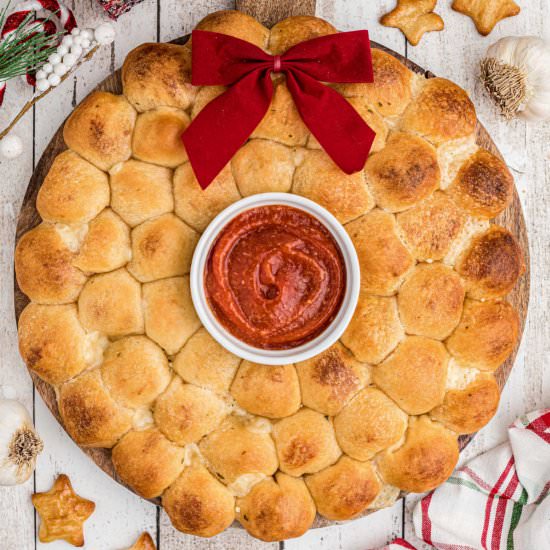 Christmas Pull Apart Bread Wreath - Recipe photo by thecaglediaries