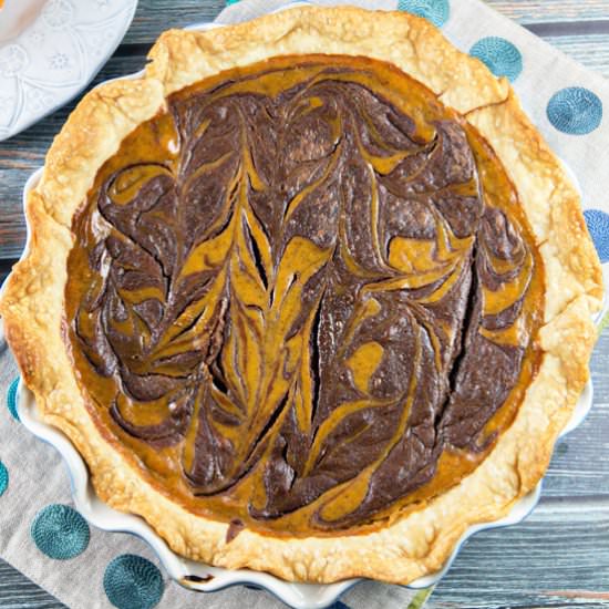 Nutella Swirled Pumpkin Pie - Recipe photo by bunsenburnerbakery