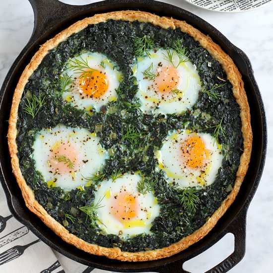 Creamy Greens Pie with Baked Eggs - Recipe photo by twoofakindcooks