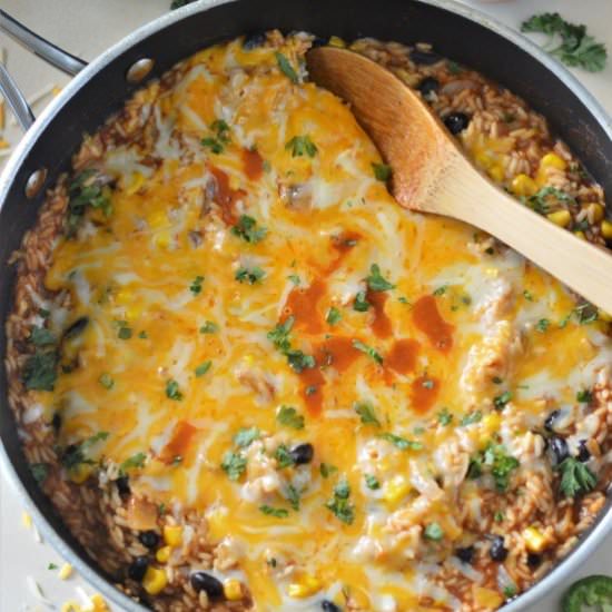 Cheesy Enchilada Rice - Recipe photo by noshingwiththenolands