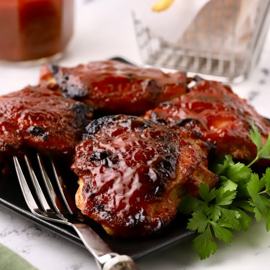 Baked BBQ Chicken Thighs - Recipe photo by Grits and Pinecones