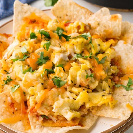 Chilaquiles with Scrambled Eggs - Recipe photo by noshingwiththenolands