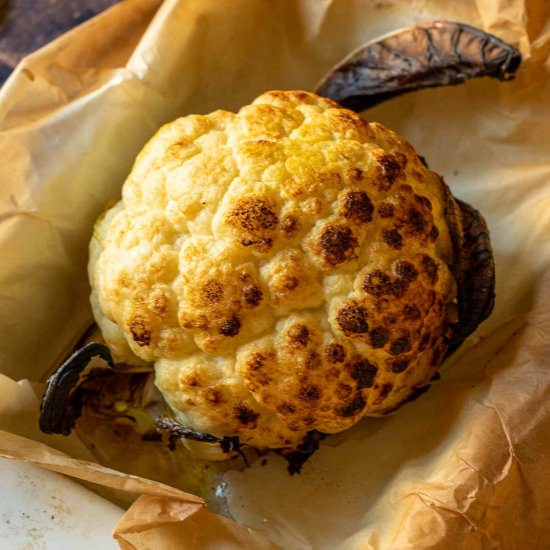 Roasted Whole Cauliflower Head - Recipe photo by Ourplantbasedworld