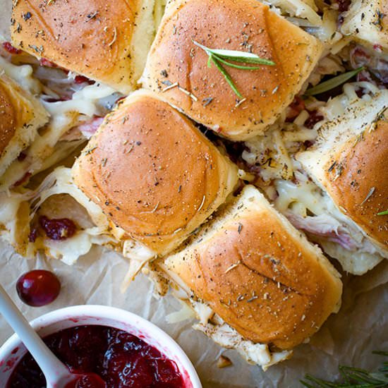 Cheesy Cranberry Turkey Sliders - Recipe photo by sipandsanity