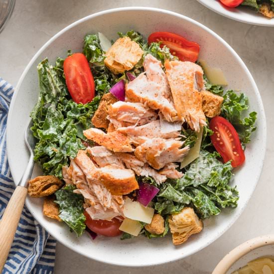 Salmon Kale Caesar Salad - Recipe photo by nourishandfete