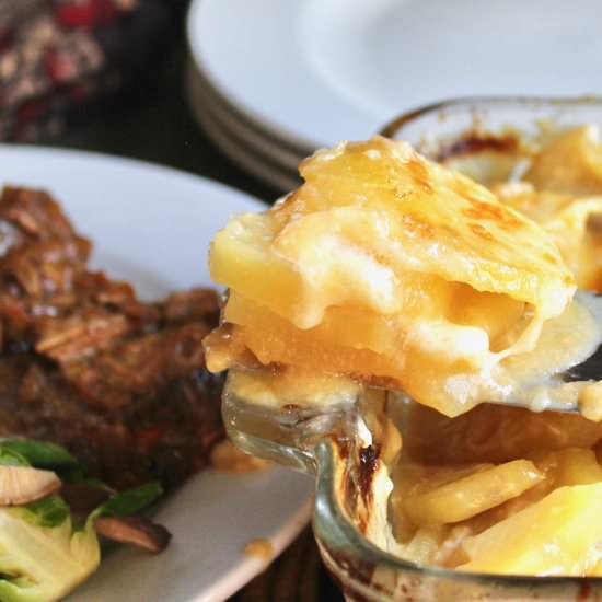 White Cheddar Cider Potato Gratin - Recipe photo by the good eats co