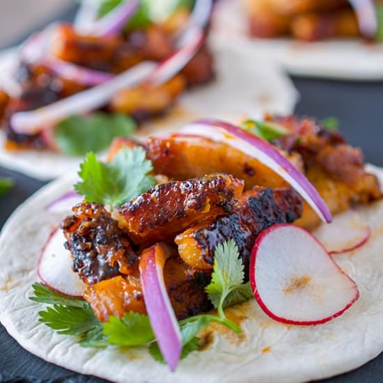 Sweet + Spicy Pork Belly Tacos - Recipe photo by sipandsanity