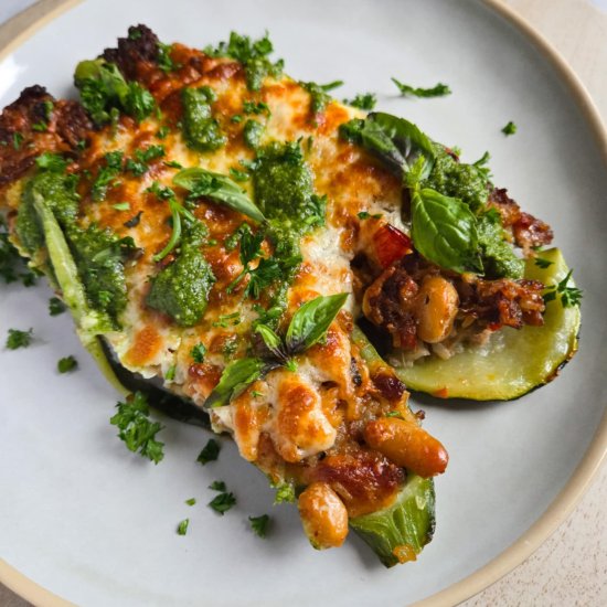 Cheesy Stuffed Zuchinni with Pesto - Recipe photo by HappyVeg1986