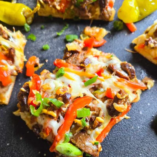 Philly Cheesesteak Flatbread - Recipe photo by HappyVeg1986