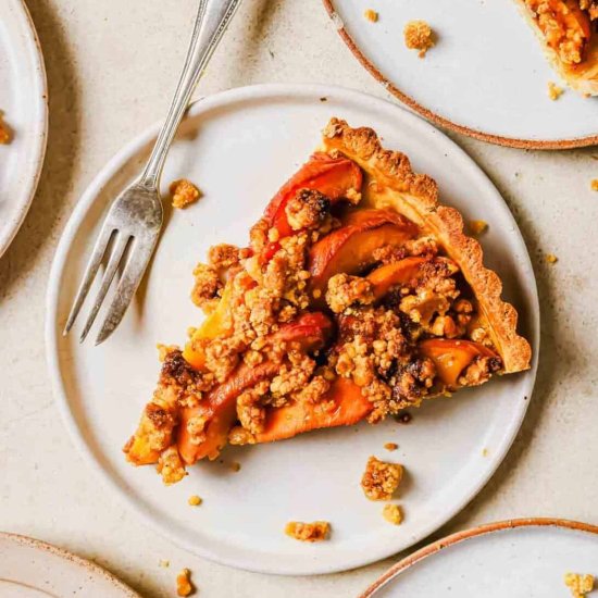 Peach Tart with Streusel Topping - Recipe photo by Running to the Kitchen