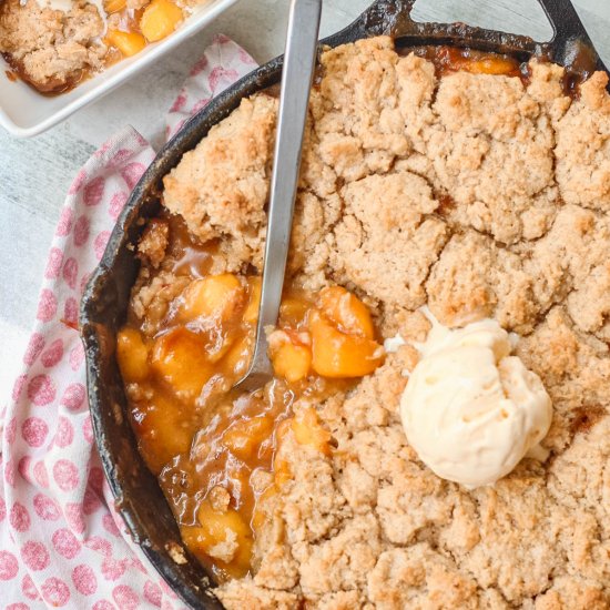 Cast Iron Skillet Peach Cobbler - Recipe photo by peanutbutterandjulie