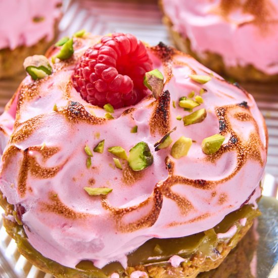 Raspberry Meringue Pistachio Pies - Recipe photo by ForThePleasureOfEating