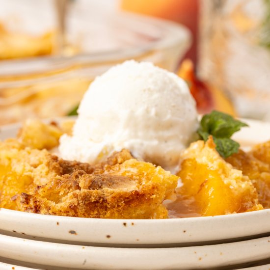Peach Cobbler Dump Cake - Recipe photo by TheChaoticTable
