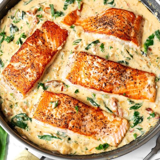Creamy Garlic Tuscan Salmon - Recipe photo by Simply Happy Foodie