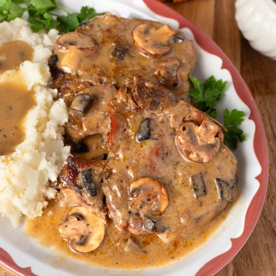 Pork Chops with Mushroom Gravy - Recipe photo by Simply Happy Foodie