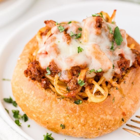 Spaghetti Garlic Bread Bowls - Recipe photo by theheirloomskillet