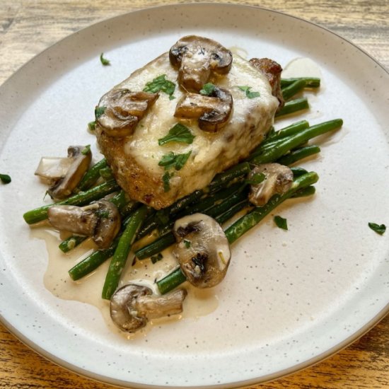 Mushroom Swiss Pork Chop - Recipe photo by thewholesomespoonblog