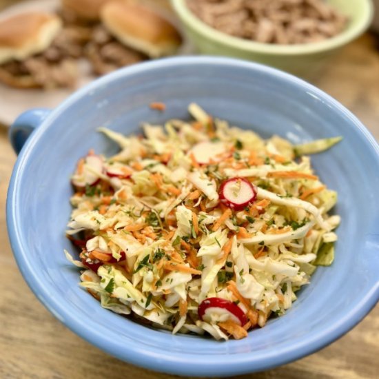 Cabbage Slaw - Recipe photo by thewholesomespoonblog