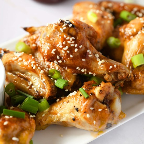 Honey Sriracha Chicken Wings - Recipe photo by SizzlingEats