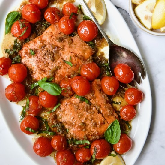 Salmon with Burst Cherry Tomatoes - Recipe photo by fromachefskitchen