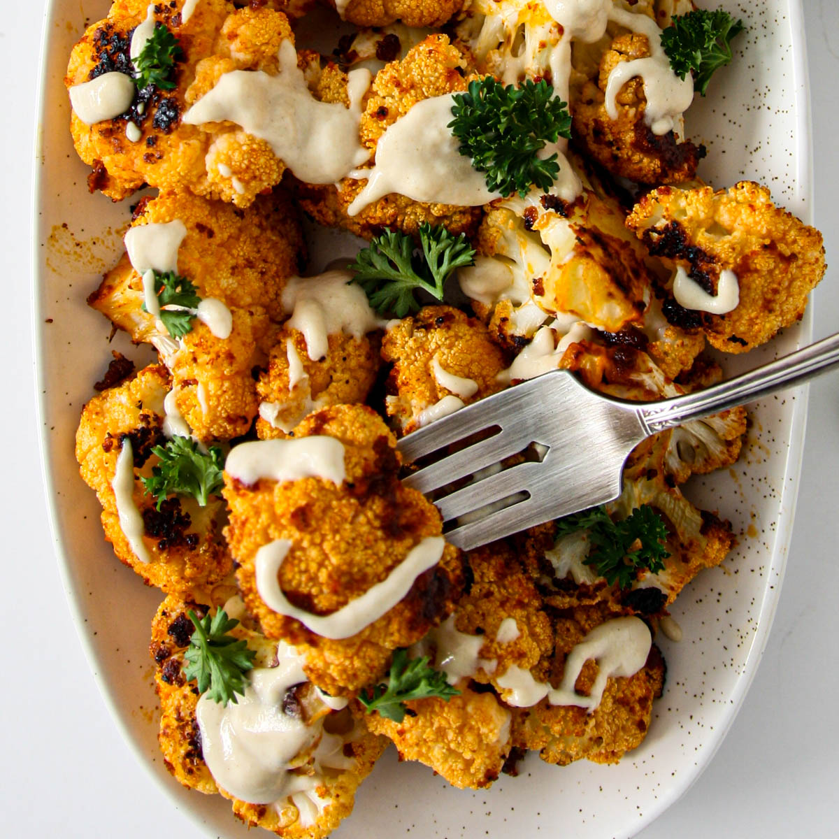 Roasted Cauliflower with Tahini - Recipe photo by the food blog