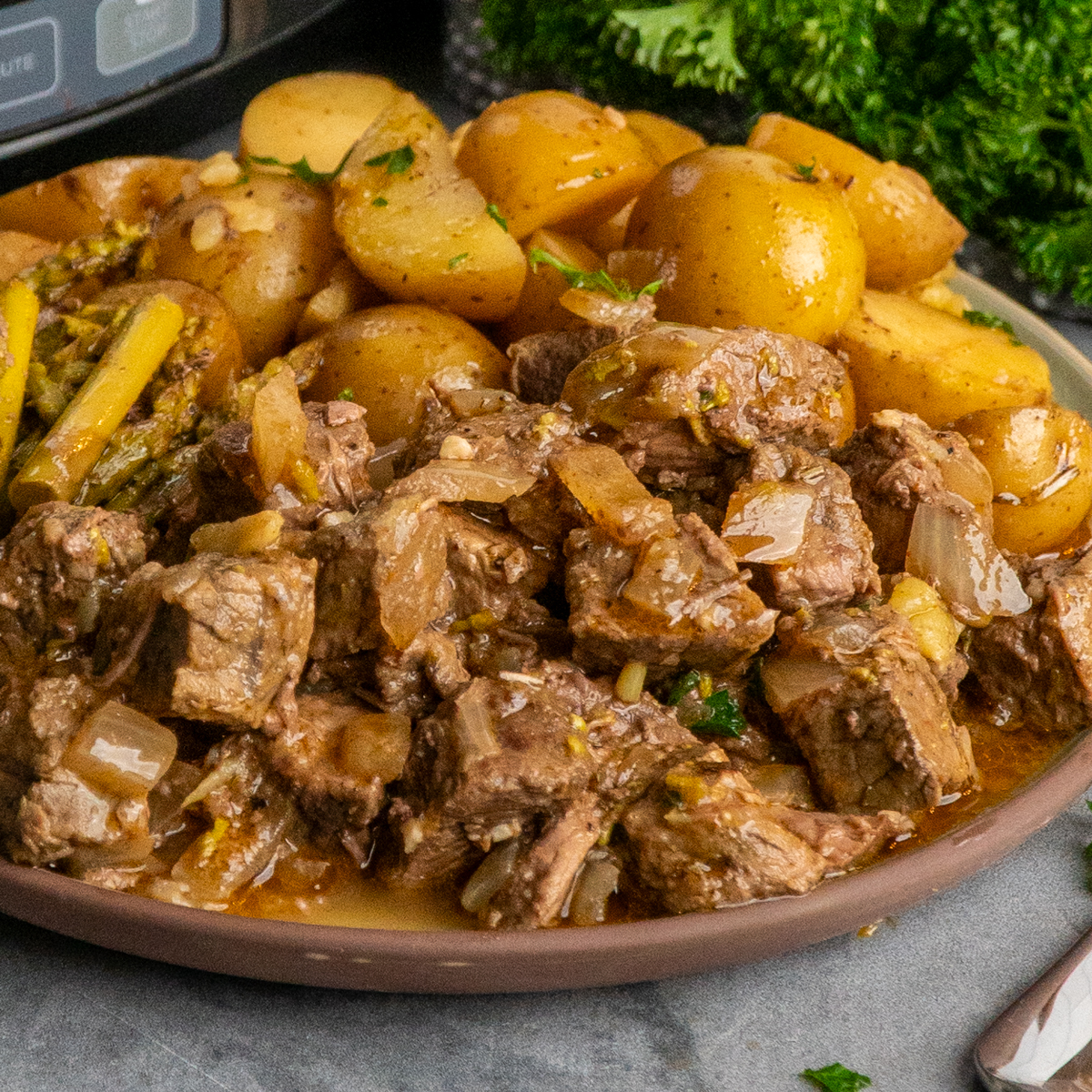 Crock Pot Garlic Butter Steak Bites - Recipe photo by SlowCookerMeals