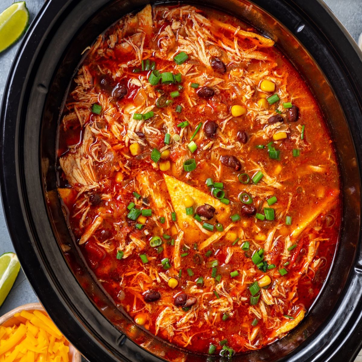 Slow Cooker Chicken Enchilada Soup - Recipe photo by Family Food on the Table