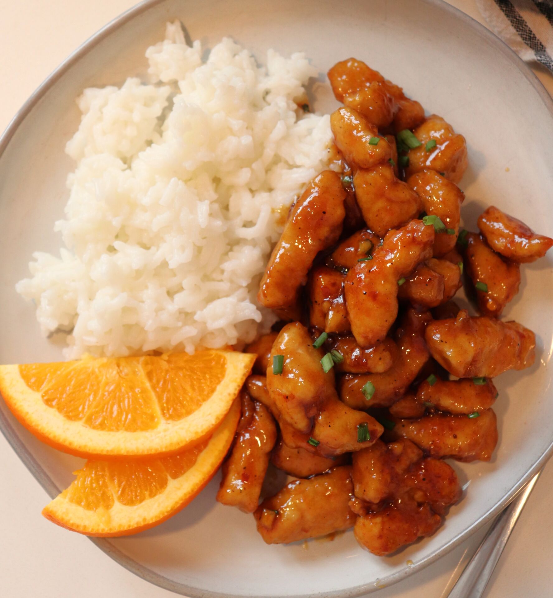 Healthy Orange Chicken - Recipe photo by Tinhateats.com