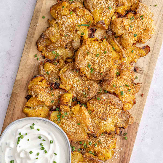Crispy Parmesan Smashed Potatoes - Recipe photo by sipandsanity