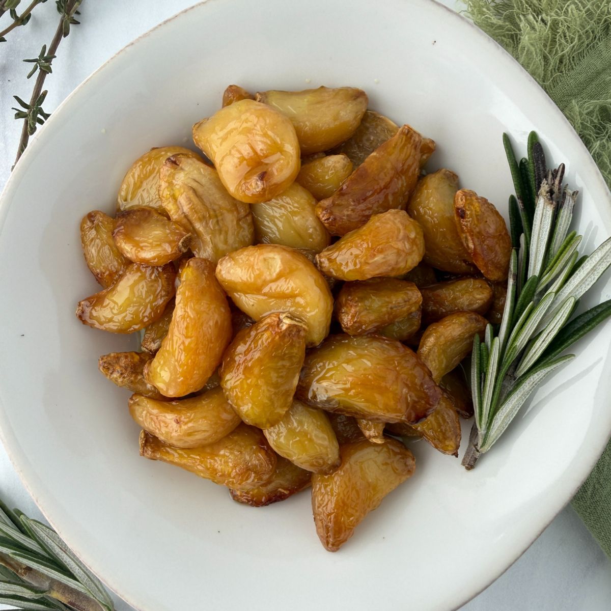 Garlic Confit With Thyme & Rosemary - Recipe photo by asweetthyme