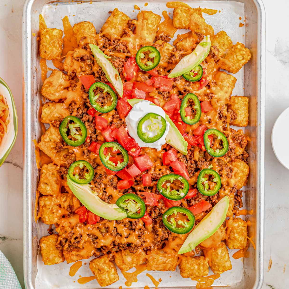 Totchos (Tater Tot Nachos) - Recipe photo by KyleeCooks