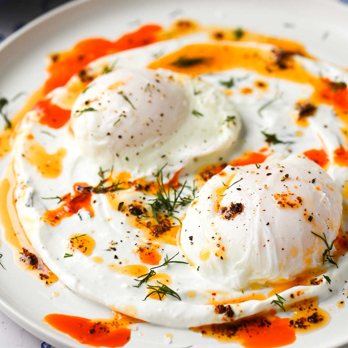 Poached Eggs with Chili Butter - Recipe photo by brunchandbatter