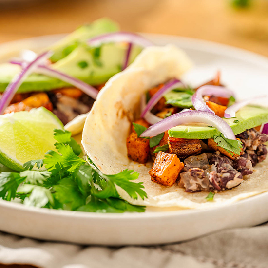 Sweet Potato + Black Bean Tacos - Recipe photo by sipandsanity