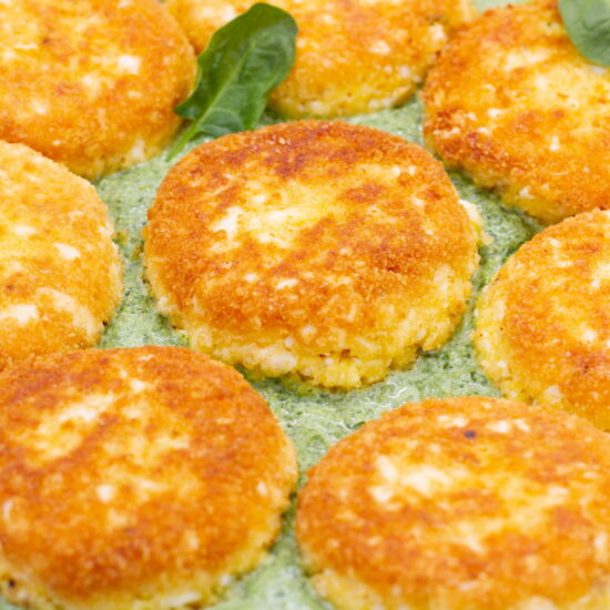 Egg Cakes with Feta in Sauce - Recipe photo by mecooks.com