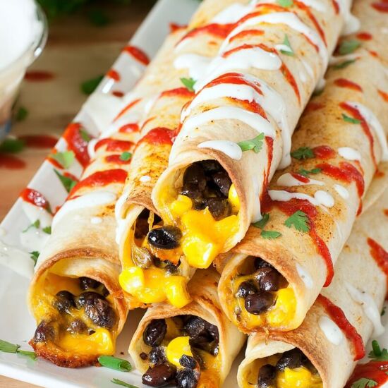 Cheesy Baked Black Bean Flautas - Recipe photo by peasandcrayons