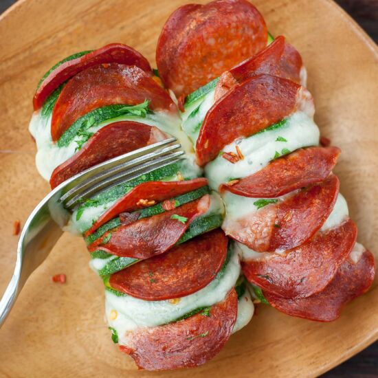Cheesy Hasselback Zucchini Pizzas - Recipe photo by peasandcrayons
