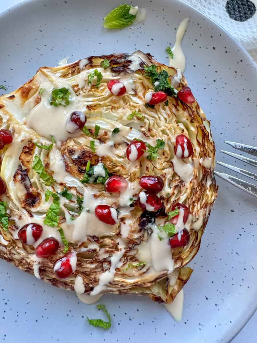 Cabbage Steaks with Tahini Dressing - Recipe photo by Mintykitchen