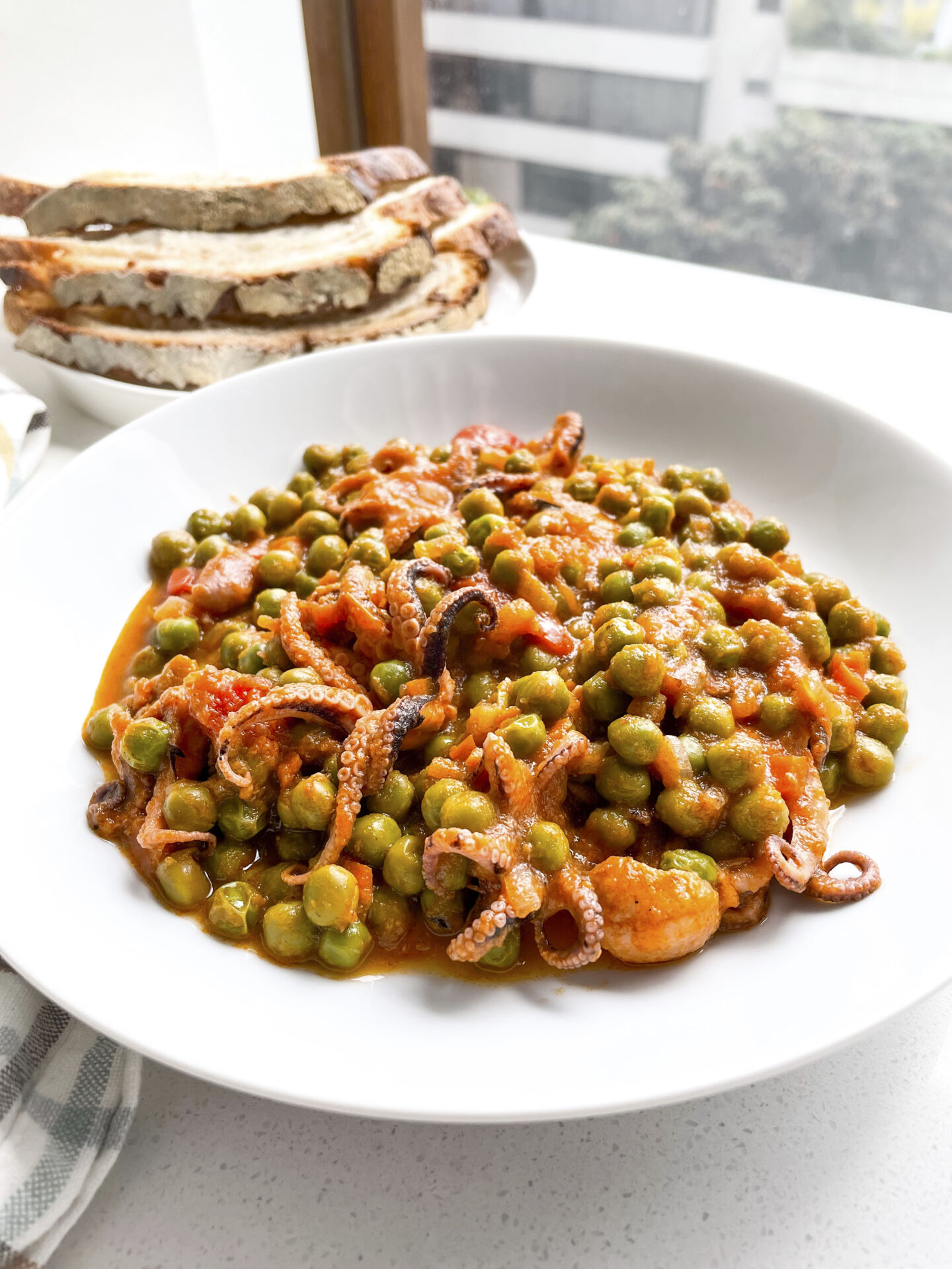 Cuttlefish with Green Peas - Recipe photo by Katya Doberti